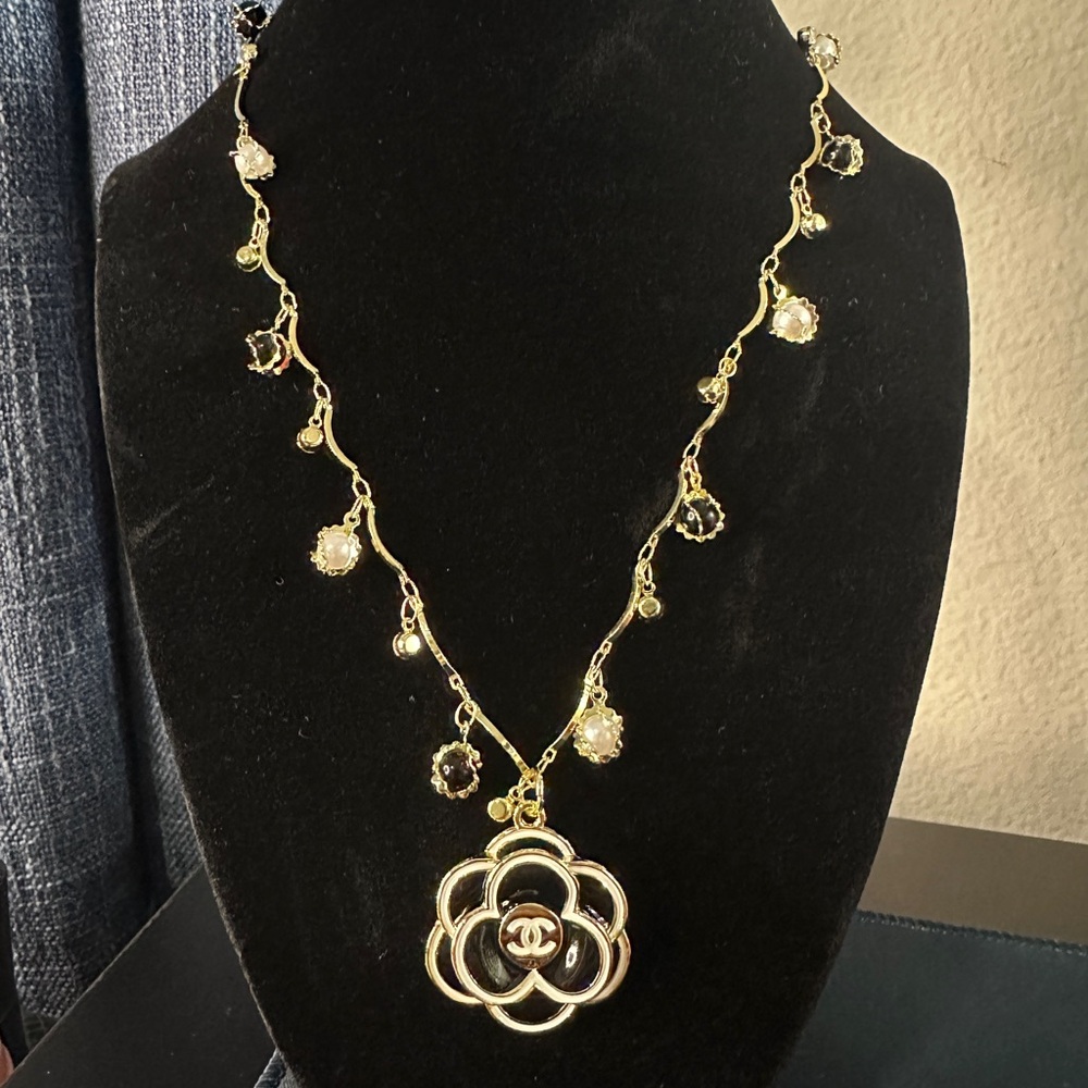 Chanel charm necklace